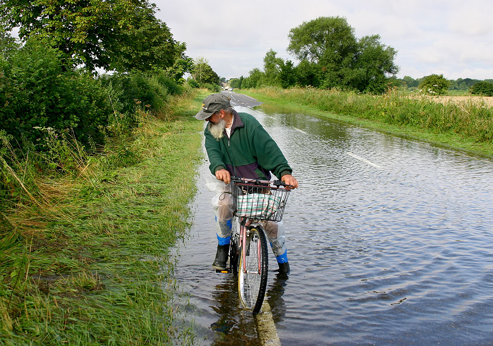 Cyclist near Clanfield in the floods